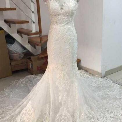 White Spaghetti Strap Mermaid Wedding Dresses..
