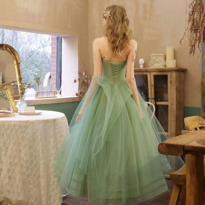 Green tulle lace tea length prom dr..