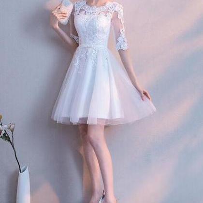 Beautiful White Tulle With Lace Top Short Sleeves..