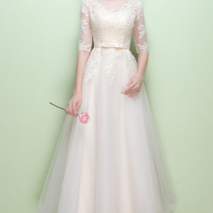 Champagne Tulle Round Neckline With Lace Applique..