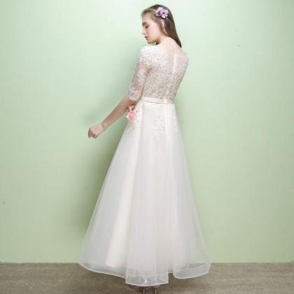 Champagne Tulle Round Neckline With Lace Applique..